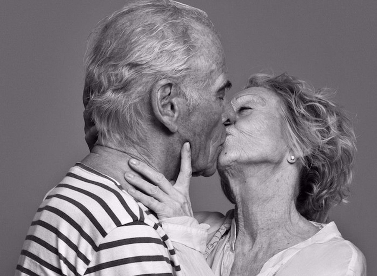 Old couple kissing