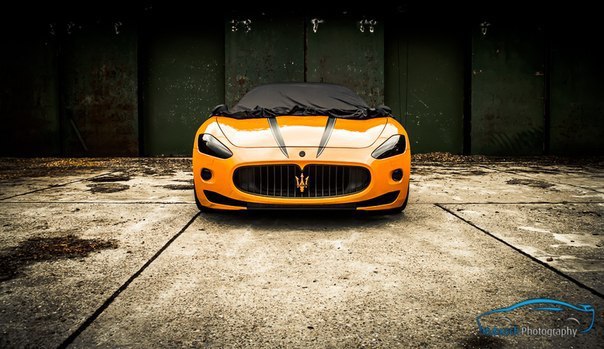 Orange Maserati GranTurismo 4.2 l SPerformance. - 2