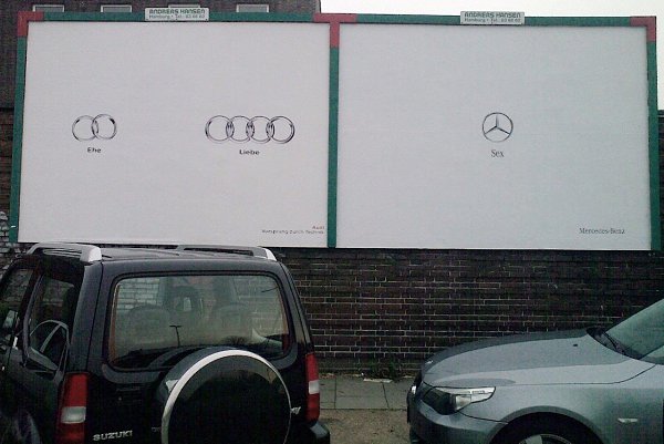 Audi разместил в Германии билборд, на котором изображение двух колец обозначает брак, а фирменные ...
