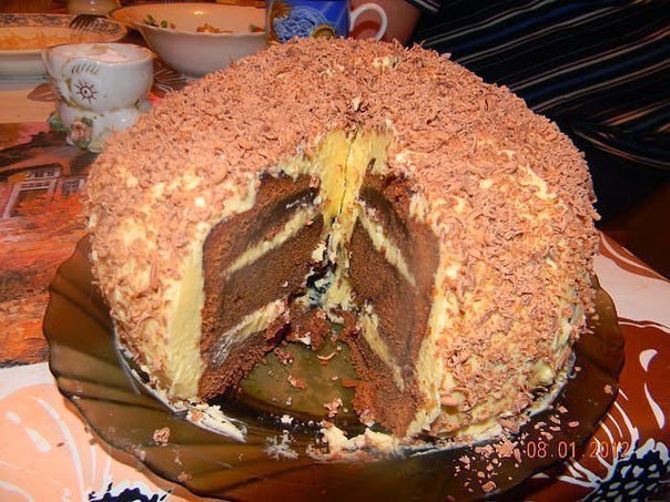 Торт - лентяй.Масло 140гр,Сахар 140гр,Шоколад200гр,Мука 120гр,яица 6шт,1.Шоколад растопить и смешать ...