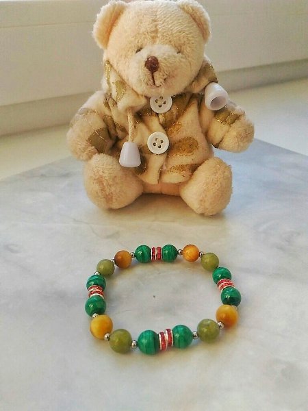 Счастье и радость несут самоцветы малахит, нефрит и тигровый глаз.Все сделано на двойной ...