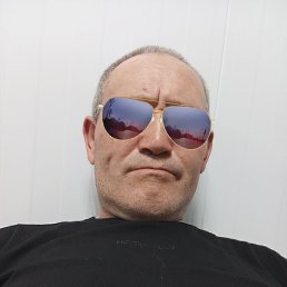 Muhammadjon Risbekov, 50, 